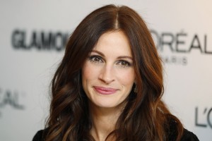 Actress Julia Roberts poses as she arrives to receive a Glamour Magazine Woman of the Year award in New York